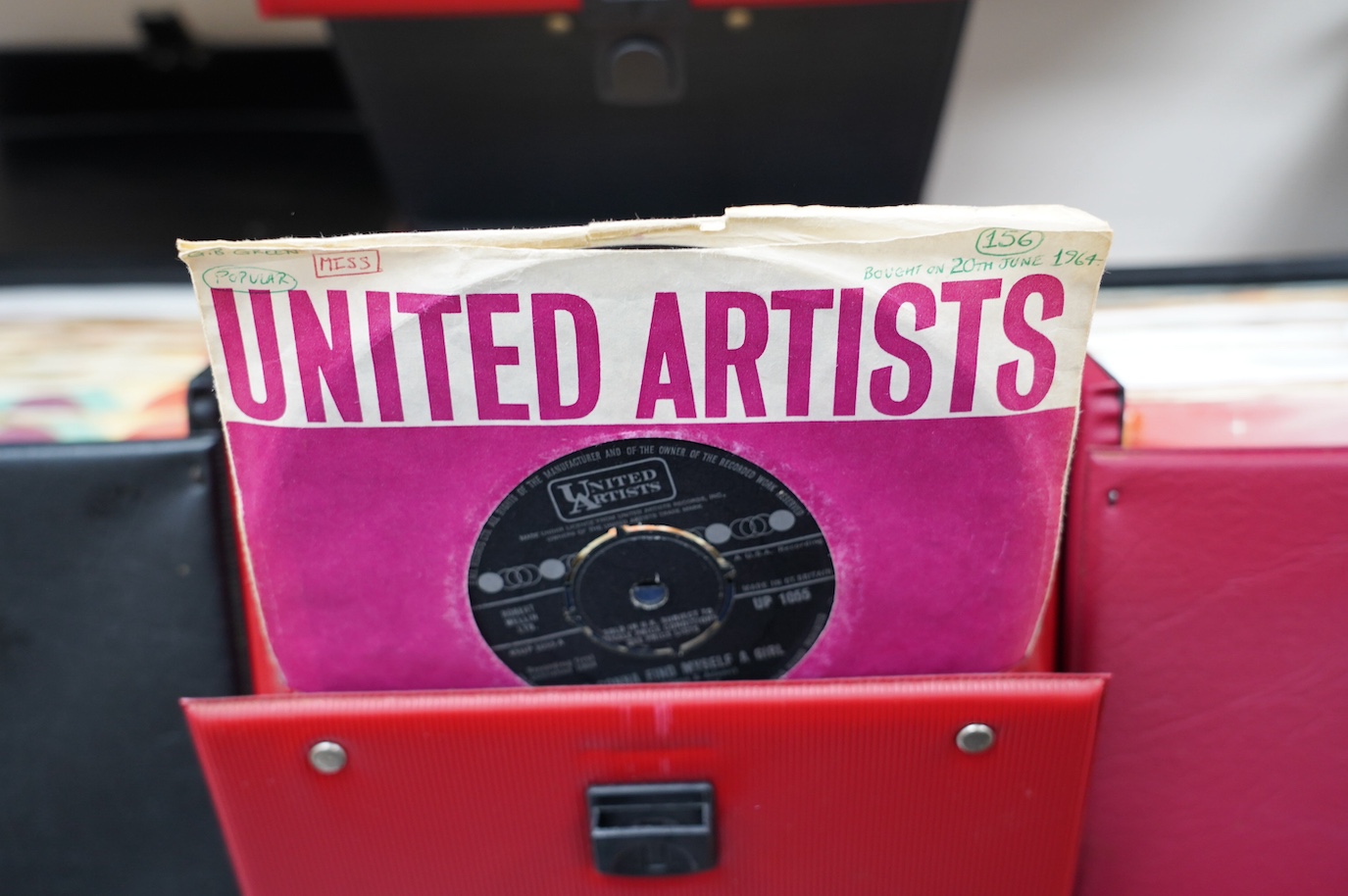 Four 7” single carry cases, containing singles on labels including; Brunswick, Decca, HMV, Pye, Columbia, etc. artists including; Bill Haley, Rod Stewart, David Bowie, Buddy Holly, Gene Vincent, Cliff Richard, Tommy Stee